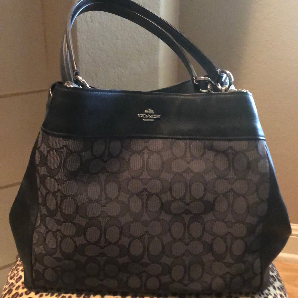 Beautiful COACH bag. Black with leather trim.